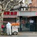 China’s two-front fight to quash the virus and revive its economy