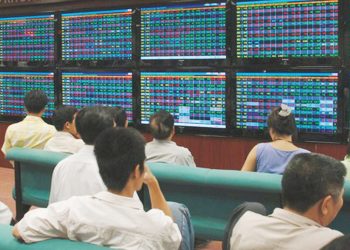 Triệu chứng “nghiện” trên sàn chứng khoán - Ảnh 1.