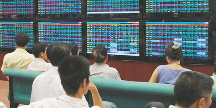 Triệu chứng “nghiện” trên sàn chứng khoán - Ảnh 1.