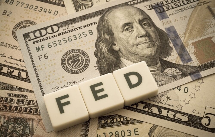 Hành động in thêm tiền của FED đối với thị trường tiền điện tử
